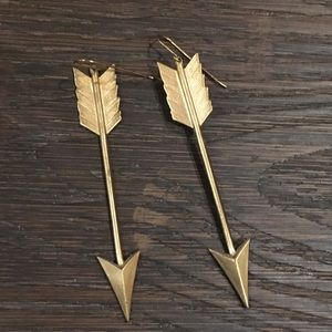 Brass tone arrow dangling earrings